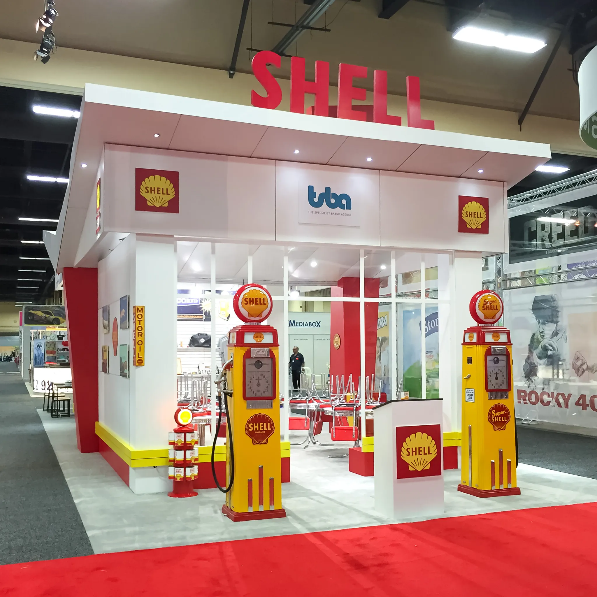 Exhibit Options custom gas station 30x30 trade show booth