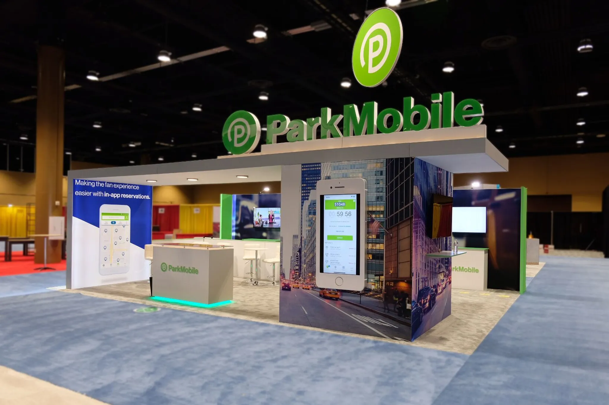 Marketing Genome 40x20 peninsular booth meeting and reception areas