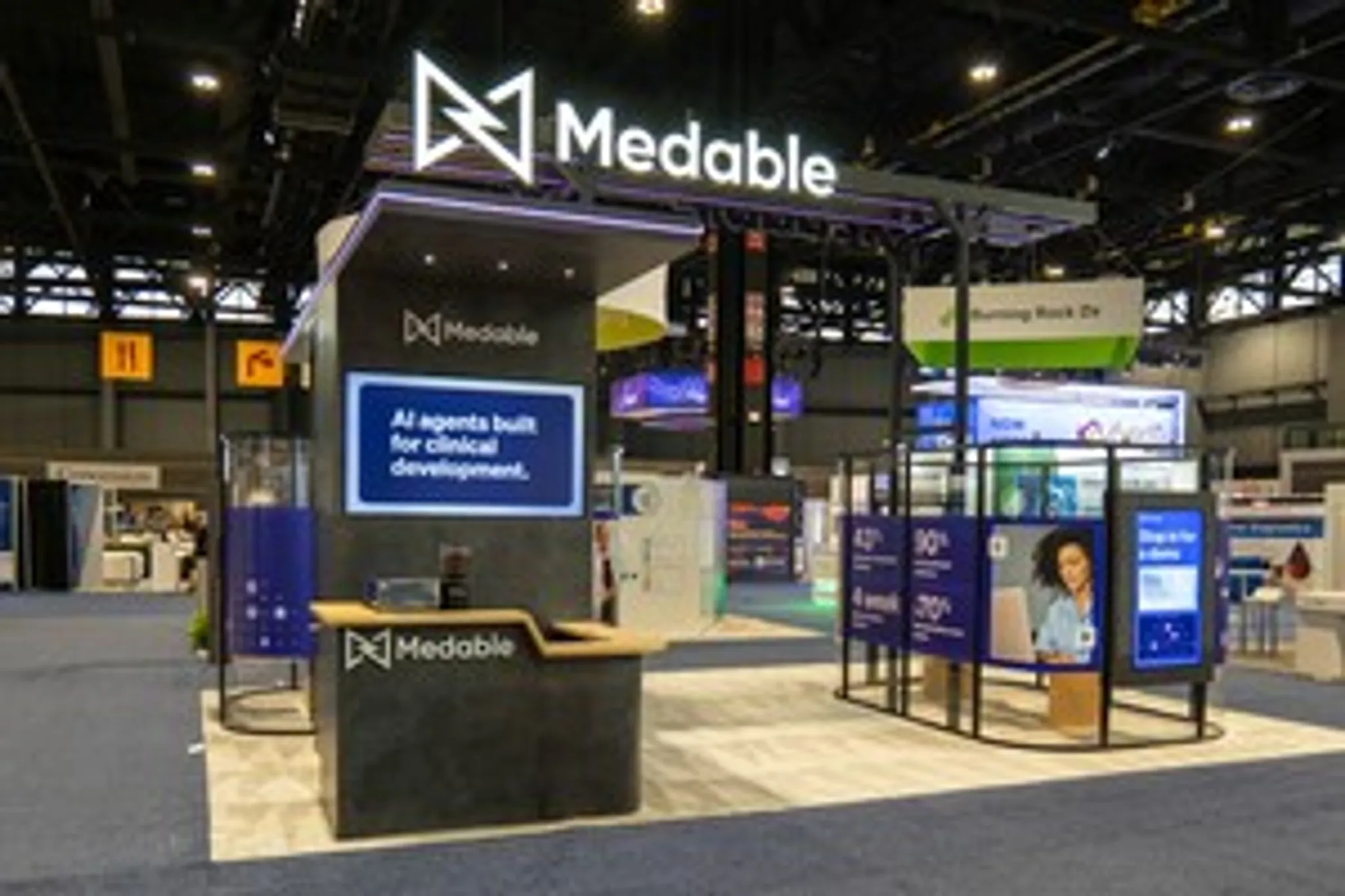 30x30 Island booth design by Absolute Exhibits