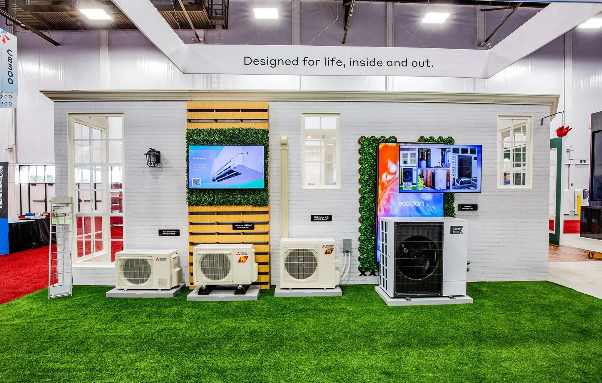 60x60 Island booth design by Dimensional Design