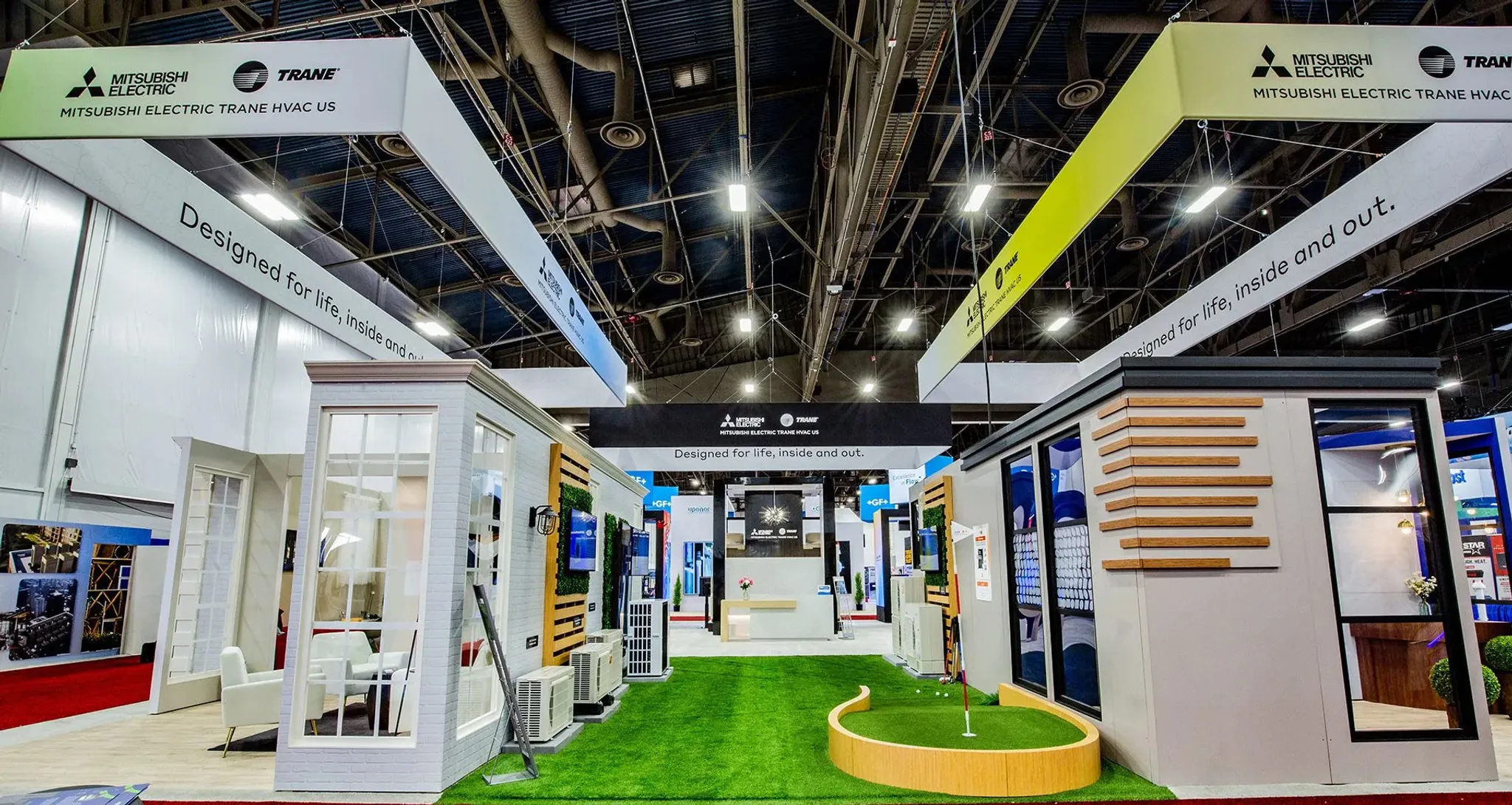 60x60 Island booth design by Dimensional Design
