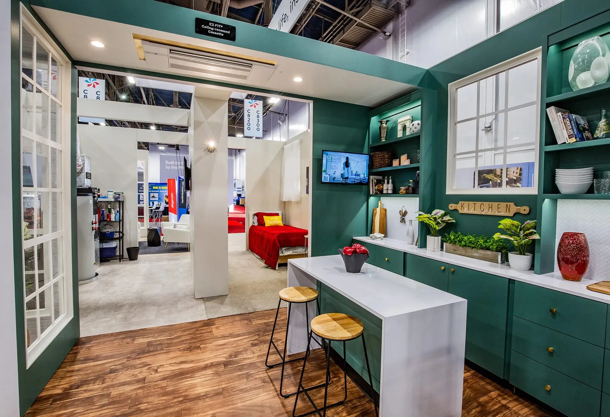 60x60 Island booth design by Dimensional Design