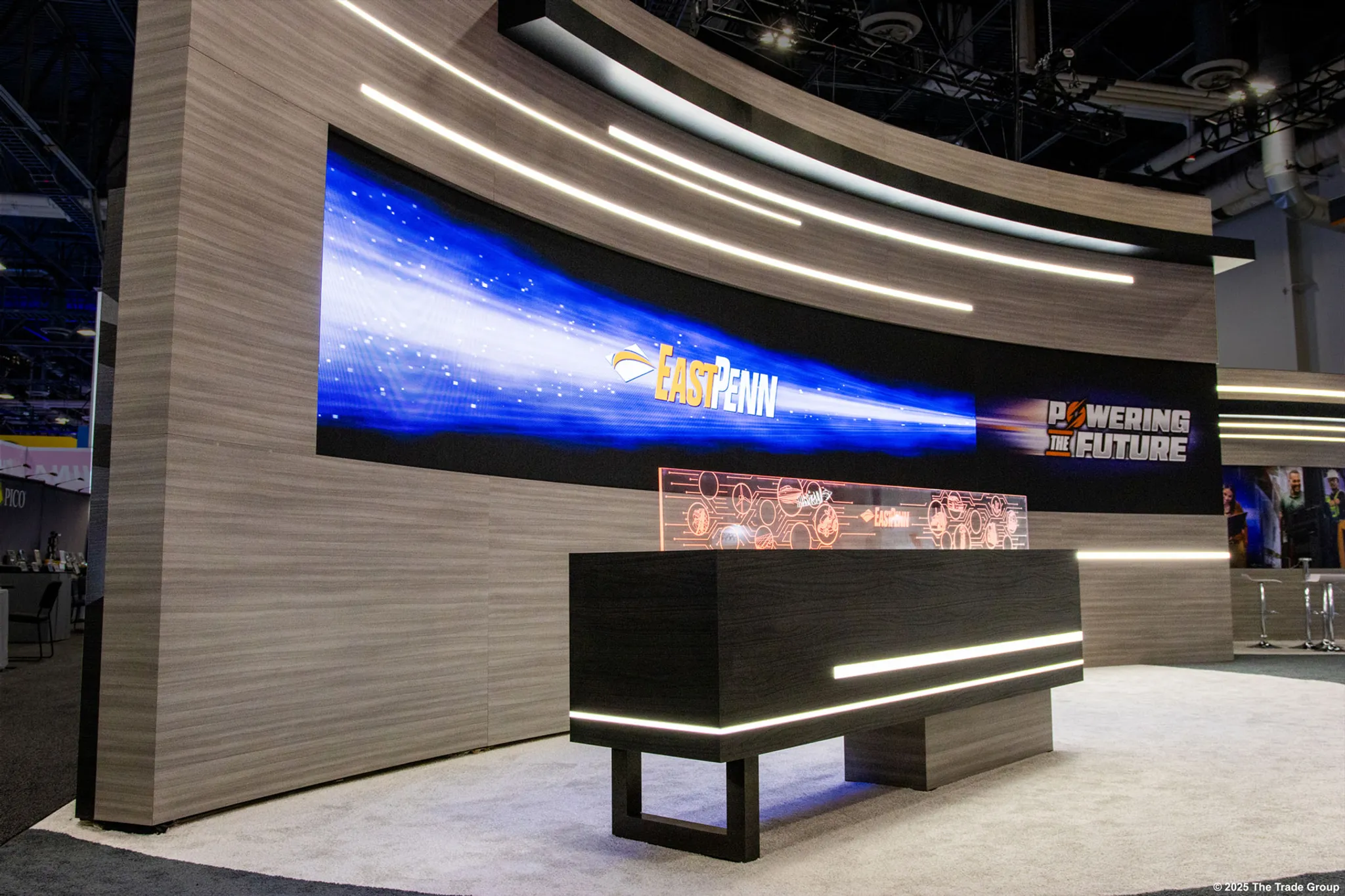 20x20 Peninsula booth design by The Trade Group