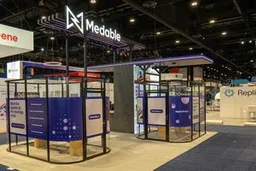 30x30 Island booth design by Absolute Exhibits