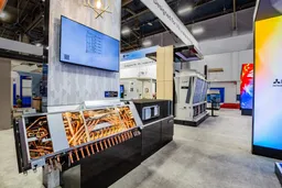 60x60 Island booth design by Dimensional Design