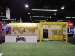 30x50 Island booth design by Exhibit Options